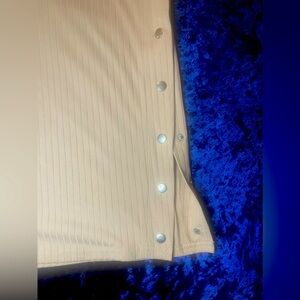 Beige tube dress with buttons near thigh area. Very sexy and comfy. NWT